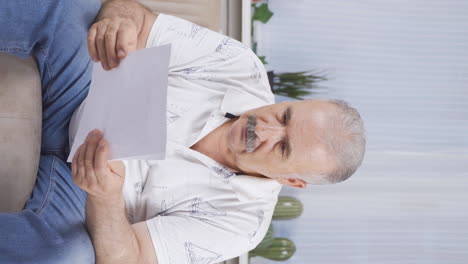 Vertical-video-of-The-old-man-who-frets-over-abusive-paperwork.