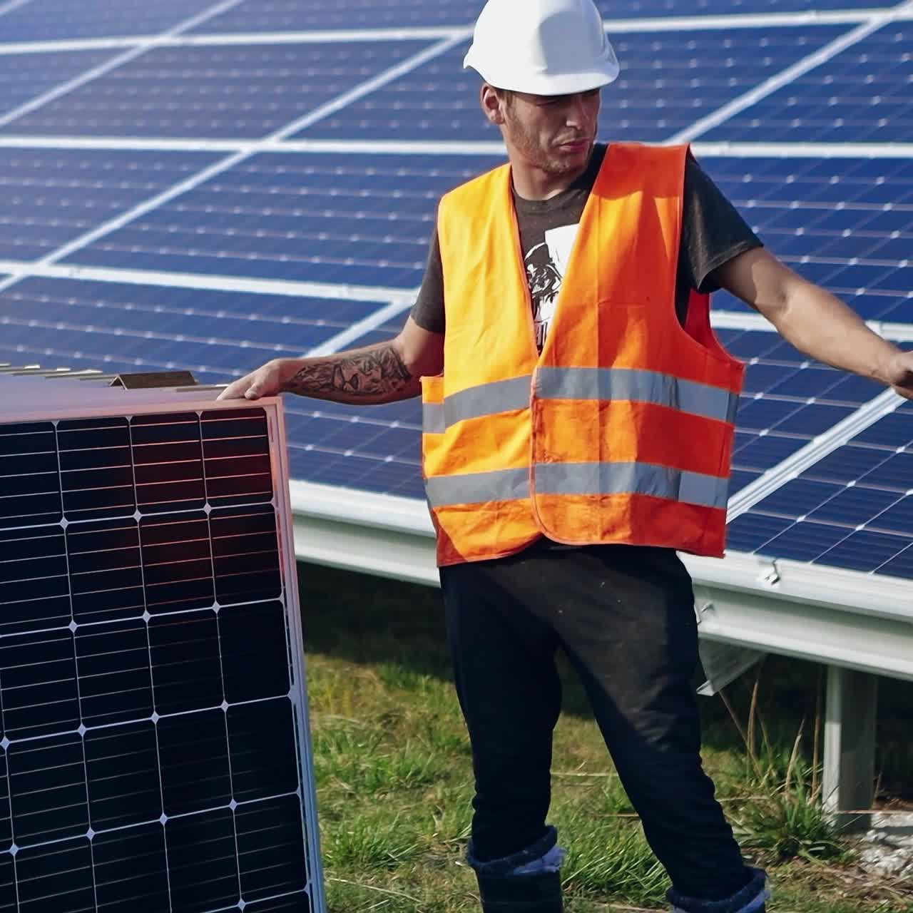 Technician installing solar panels