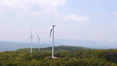 wind turbines rotating in a serene natural setting