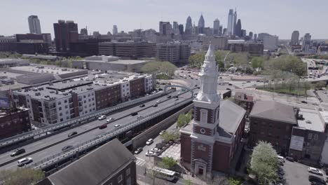 drone footage of bustling philadelphia highway and st