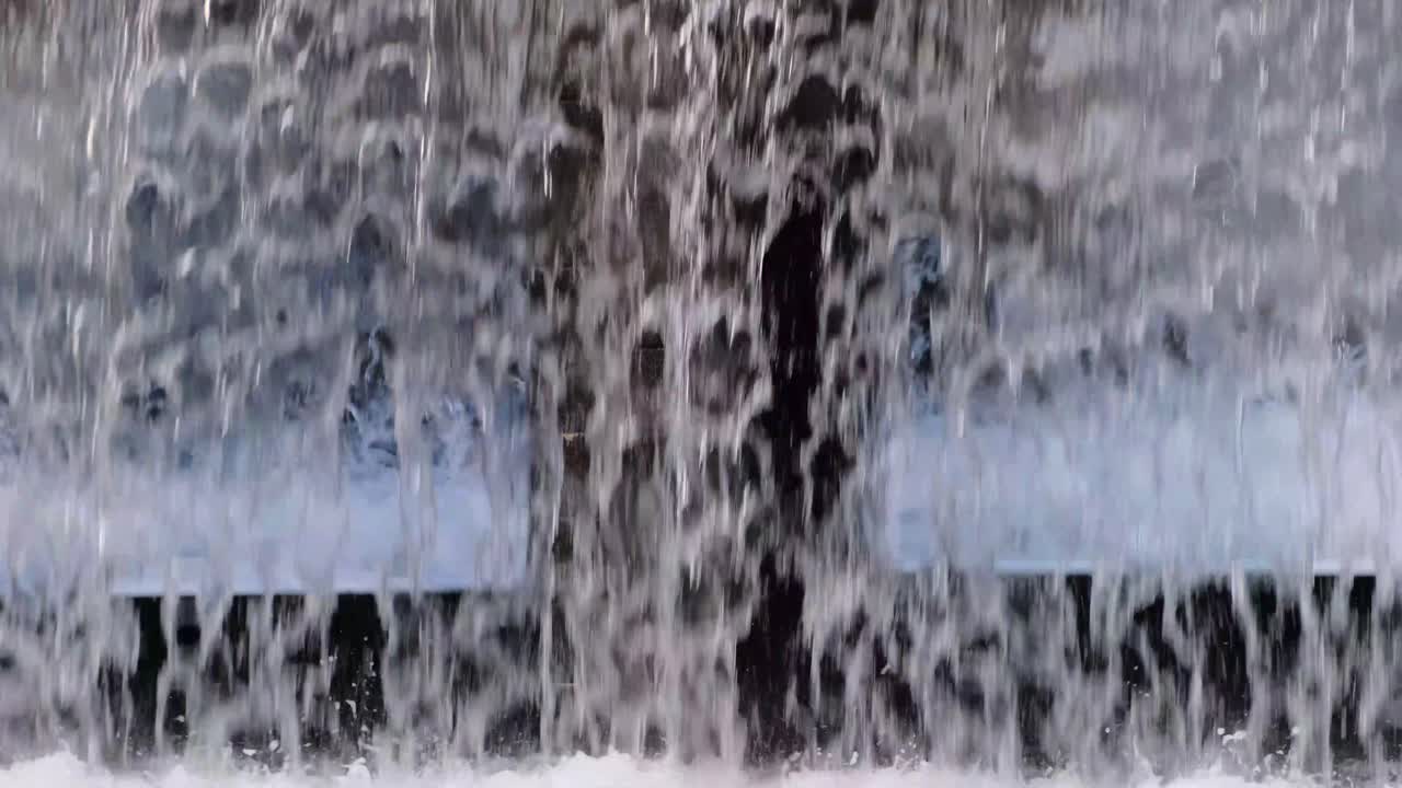 Water falling in the city in slow motion