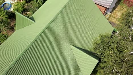 green metal roof on a residential house