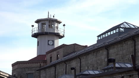 penitentiary guard tower and cellblock with multiple skylights