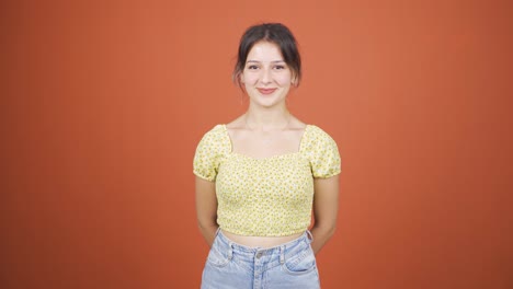 Young-woman-smiling-at-camera