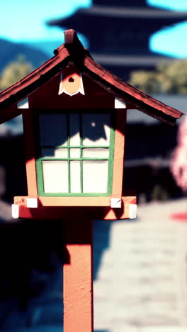 japanese lantern in front of a pagoda