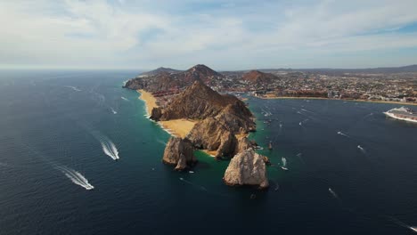 Aerial-view-around-the-cape-of-Cabo-San-Lucas,-sunny-Mexico---circling,-drone-shot