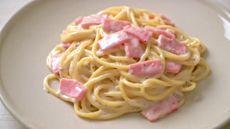 homemade spaghetti white cream sauce with ham - italian food style