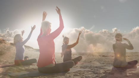 animación de luz brillante sobre mujeres mayores felices practicando yoga a la orilla del mar