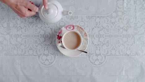 tea is poured into a teacup