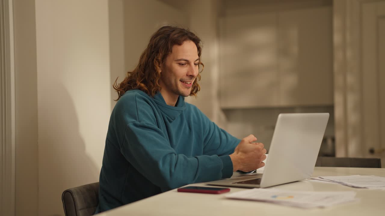 Man having a video call on his laptop