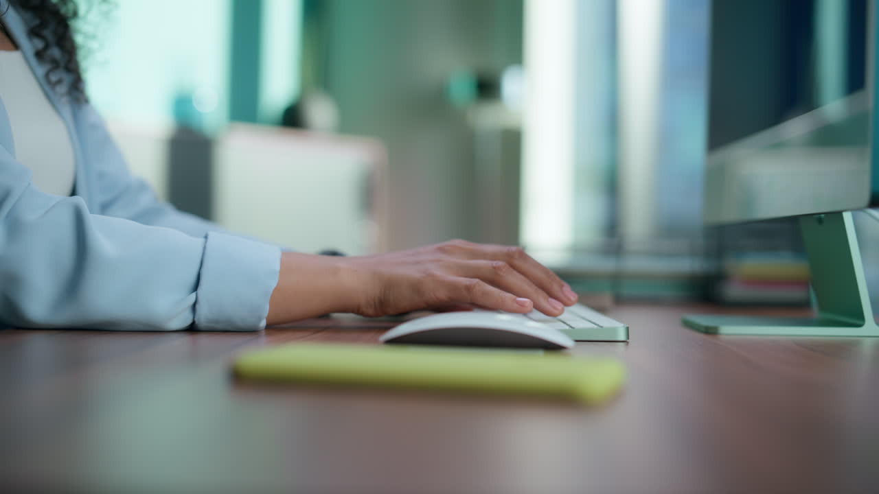 Unknown woman typing using computer mouse closeup. Boss fingers pressing buttons