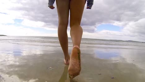 Fit-woman-walking-into-the-sea