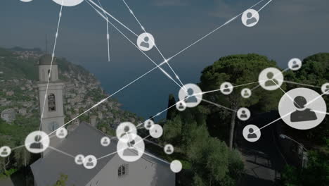 network of connections and social media icons animation over coastal landscape