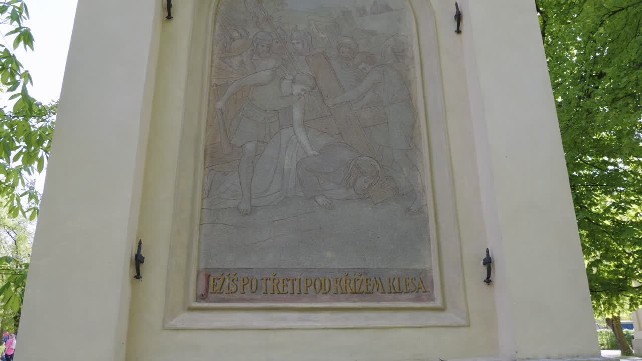 the ninth station of the Way of the Cross, depicting Jesus falling for the third time under the weight of the cross, located in Petř&iacute;nsk&eacute; sady on Petř&iacute;n Hill in Prague, Czech Republic