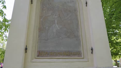 the ninth station of the way of the cross, depicting jesus falling for the third time under the weight of the cross, located in petřínské sady on petřín hill in prague, czech republic