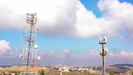 telecommunication towers in a rural/urban landscape