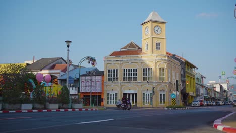 restored chino-portuguese clock tower  old building landmark in phuket old town, thailand.