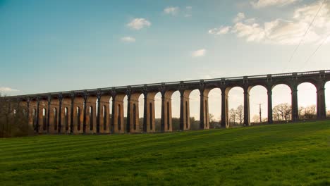 time-lapse of clouds passing by over ouse viaduct at sunset