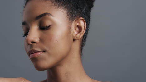 close-up-portrait-beautiful-african-american-woman-gently-touching-face-with-hands-enjoying-smooth-healthy-skin-complexion-natural-feminine-beauty-skincare-concept