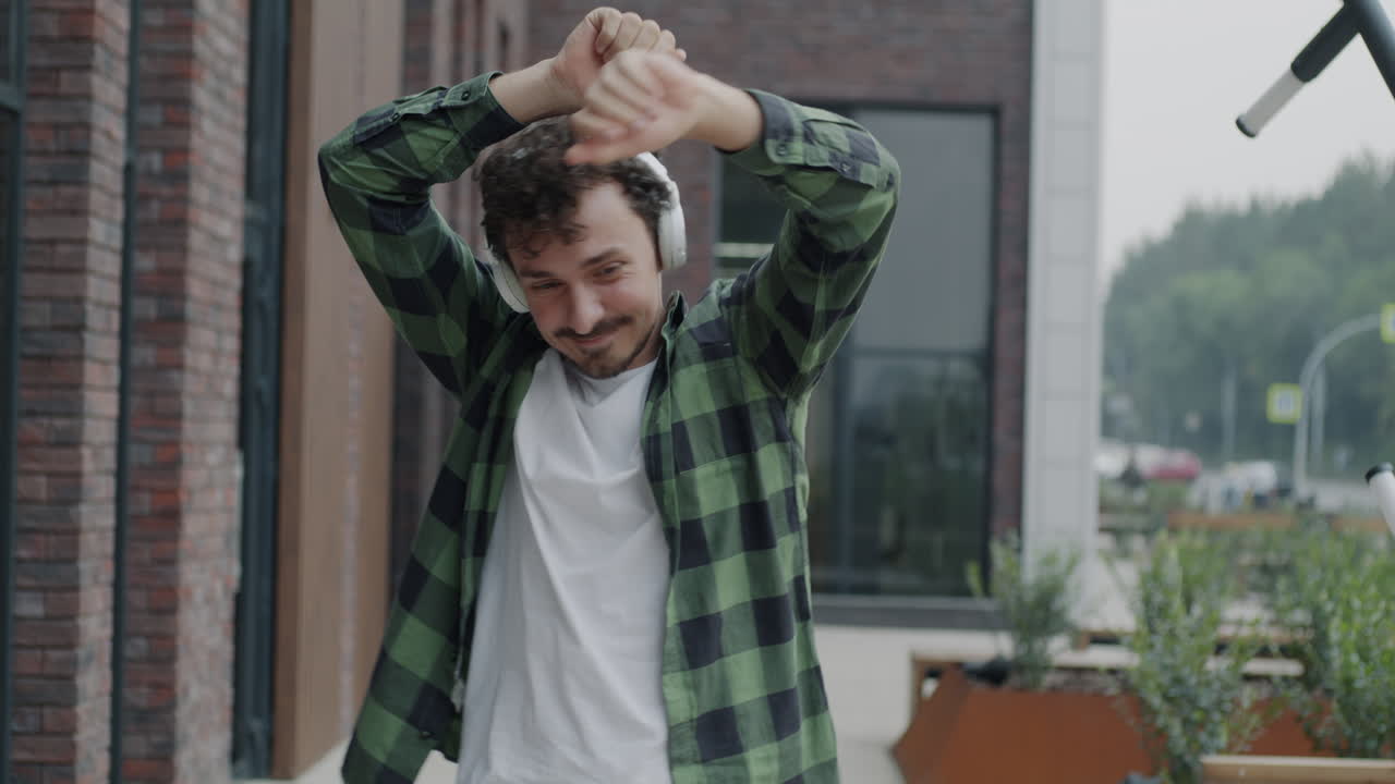 Man Dancing in the City