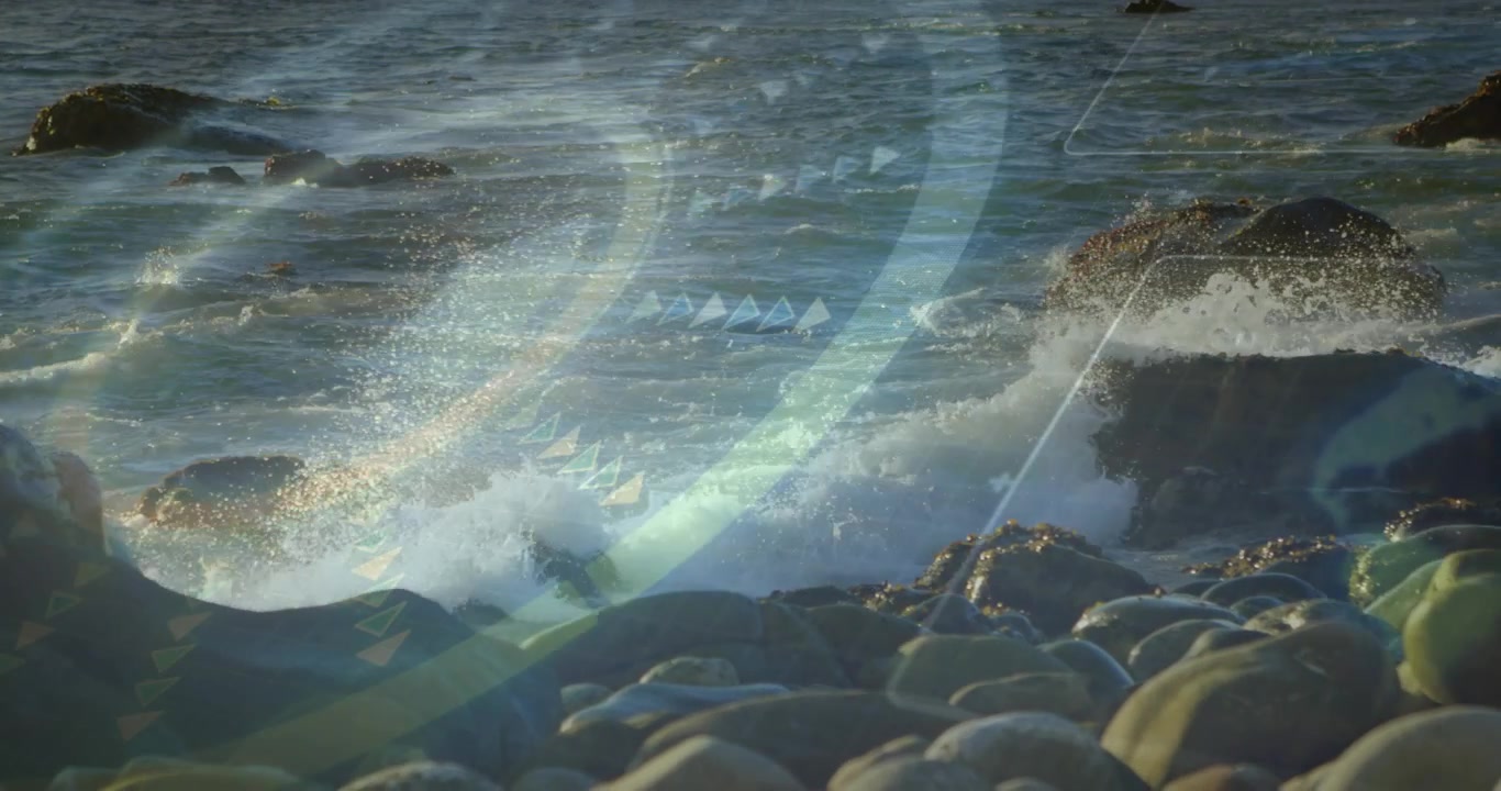Swell moving in, waves curling and striking mid-right rock, spraying, receding, overlay drifting