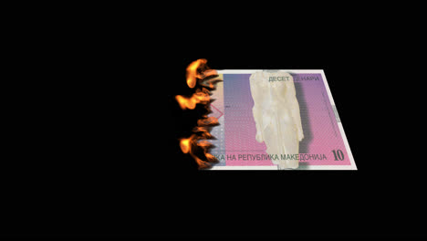 burning macedonian 10 denar banknote