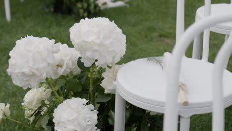 white hydrangea and chair wedding decor