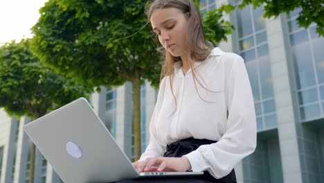 serious and focused: nordic beautiful blonde woman working, slow motion