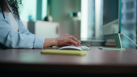 Closeup-businesswoman-arms-typing-keyboard-in-office.-Unknown-ceo-using-computer