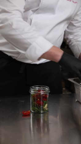 chef preparing food preservation jars