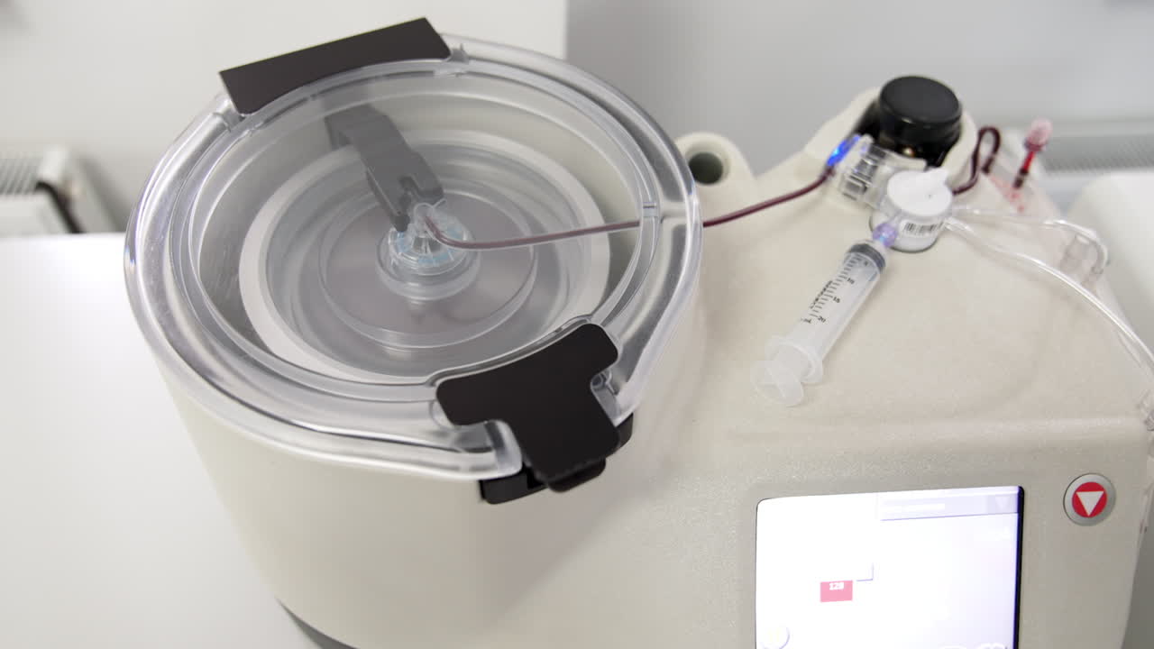 Centrifuge machine producing concentrate from blood. Plasma extraction with modern equipment. Top view.