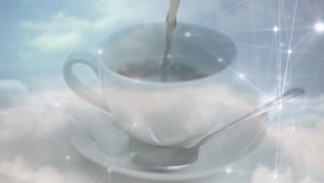dark liquid pouring into white cup with spoon and sugar cubes over glowing digital network grid