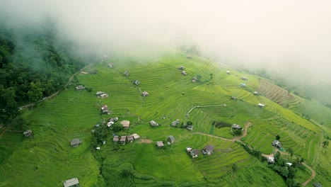 4K-Cinematic-nature-aerial-drone-footage-of-the-beautiful-mountains-and-rice-terraces-of-Ban-Pa-Pong-Piang-at-Doi-Ithanon-next-to-Chiang-Mai,-Thailand-on-a-cloudy-sunny-day