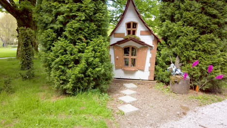 Fairy-tale-play-house-in-public-park,-nobody,-childhood-and-outdoor-playing