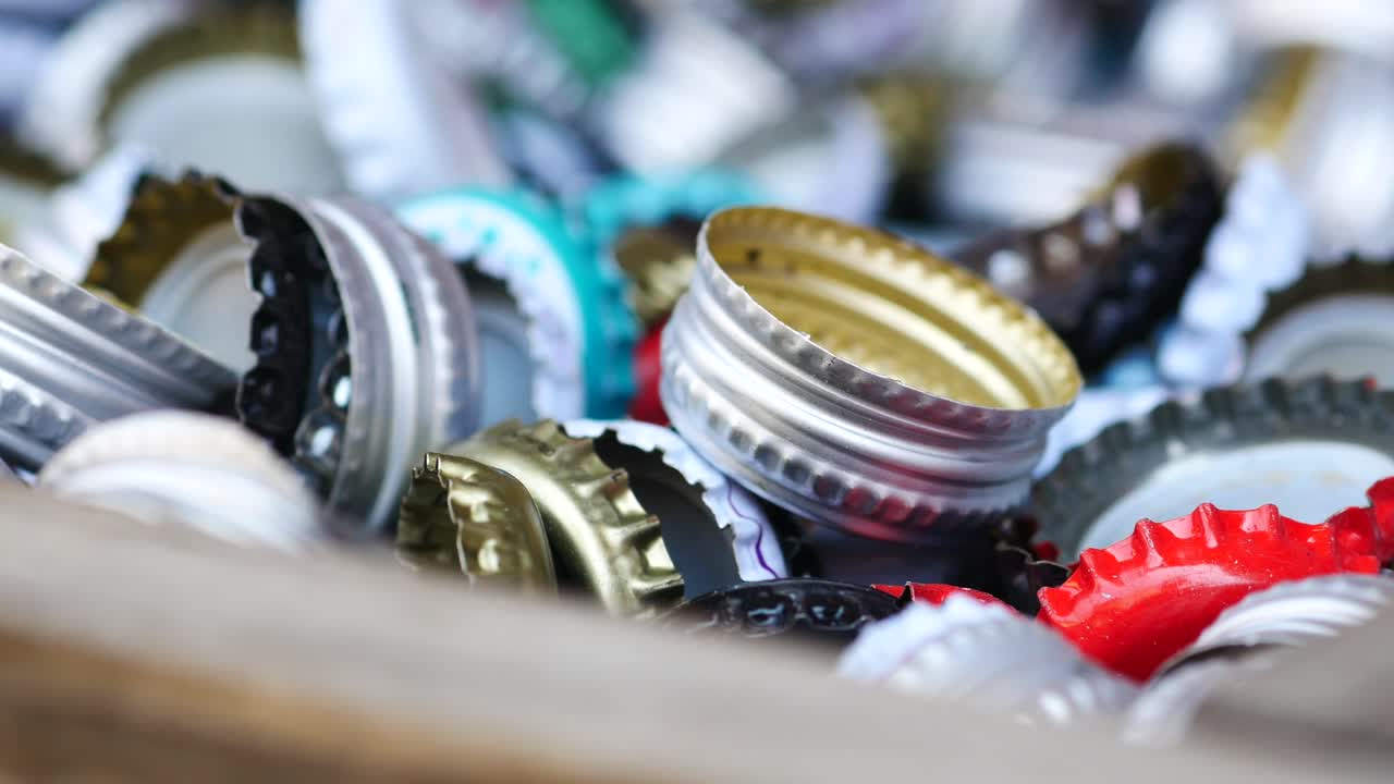 A pile of colorful bottle caps