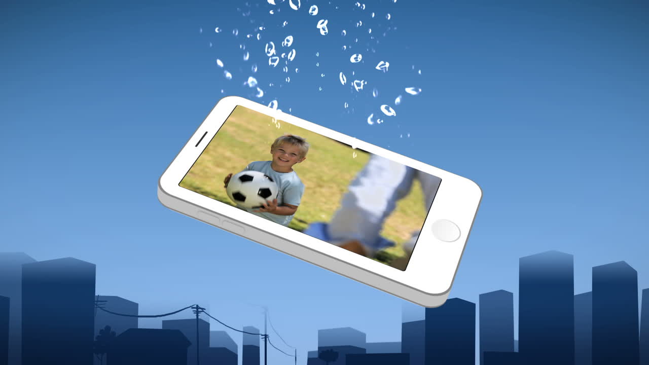 스마트폰은 소년과 그의 아버지가 놀고 있는 것을 보여줍니다.