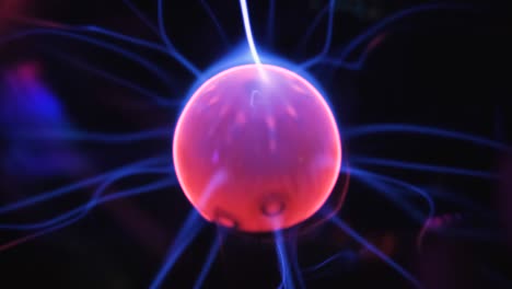 working plasma globe or plasma lamp is a clear glass ball filled with a mixture of various noble gases with a high-voltage electrode in the center of the container.