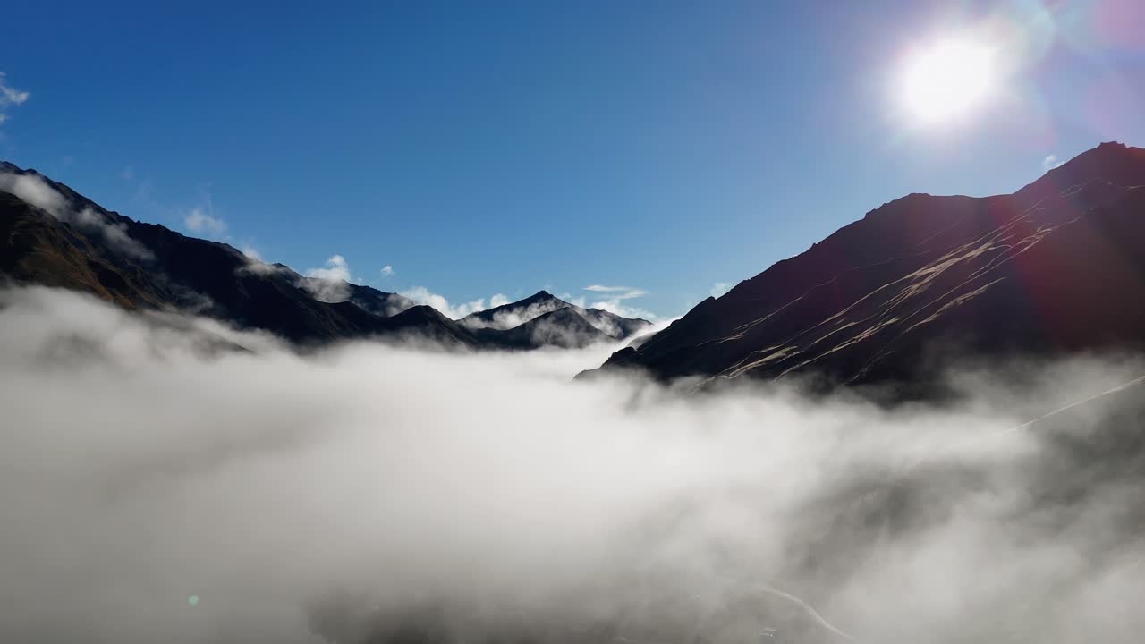 Animation reveals a breathtaking mountain landscape through an airplane window, transitioning from interior to expansive exterior view