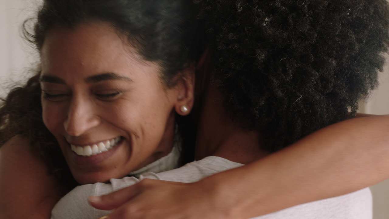 happy couple hugging woman embracing boyfriend sharing good news enjoying romantic relationship at home