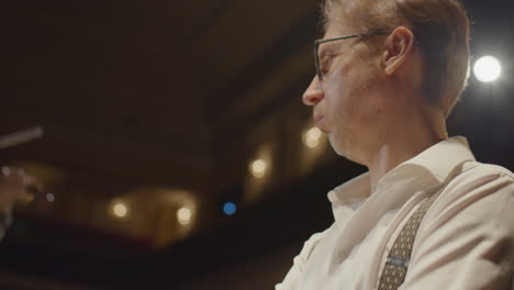 musician playing piano with accompaniment by violin