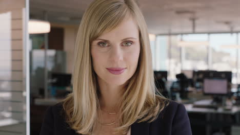 portrait attractive blonde business woman smiling confident female office manager enjoying successful career in corporate management professional at work