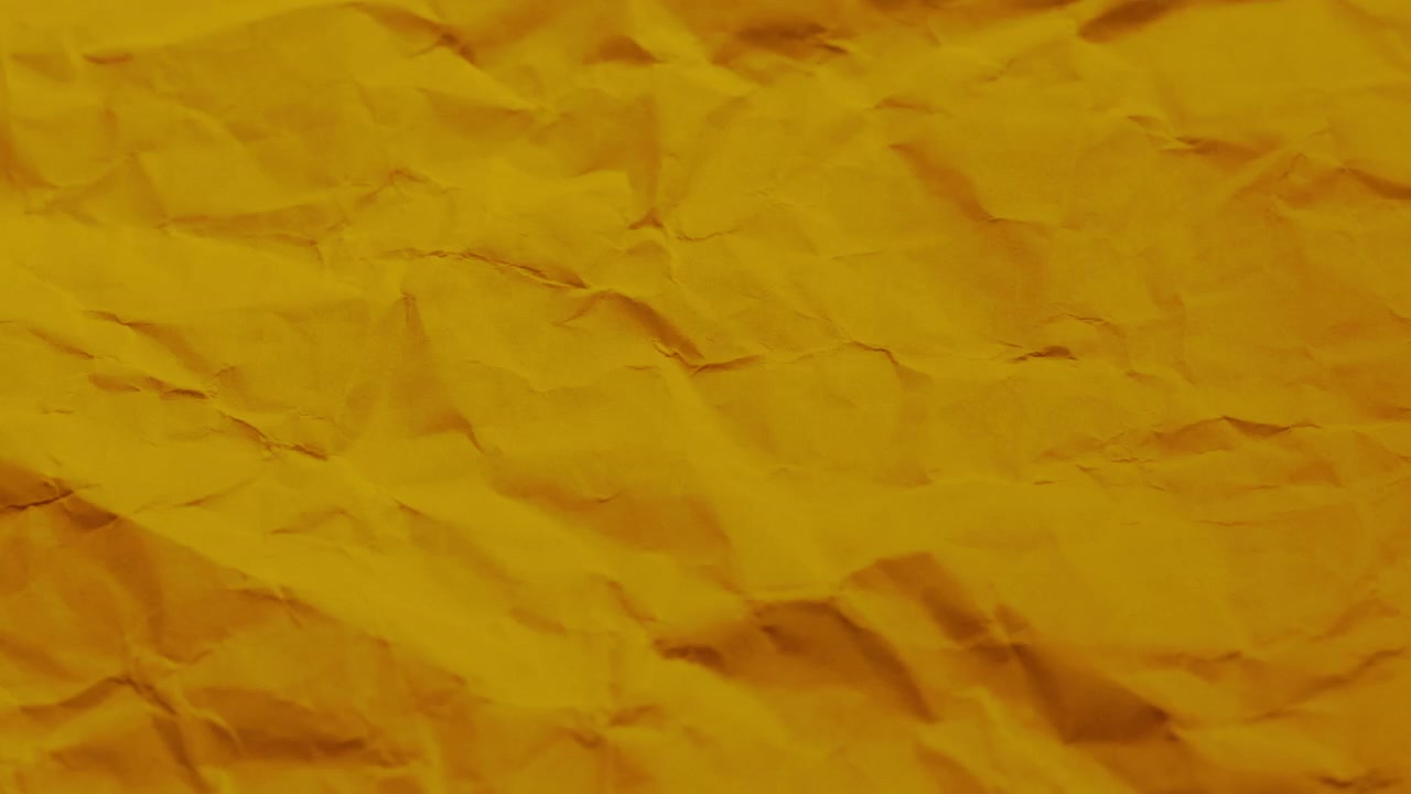 Orange Stop Motion Real Crinkled Paper Texture. Organic, tactile texture is perfect for overlays, transitions, or as a background for sketchy typography and hand-drawn animation
