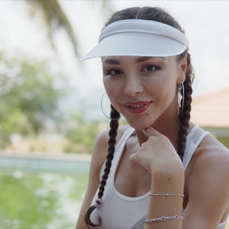 cheerful sportswoman smiling for camera