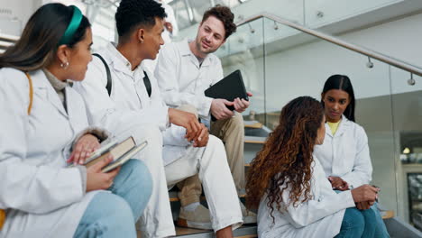 group, college and medical students on stairs