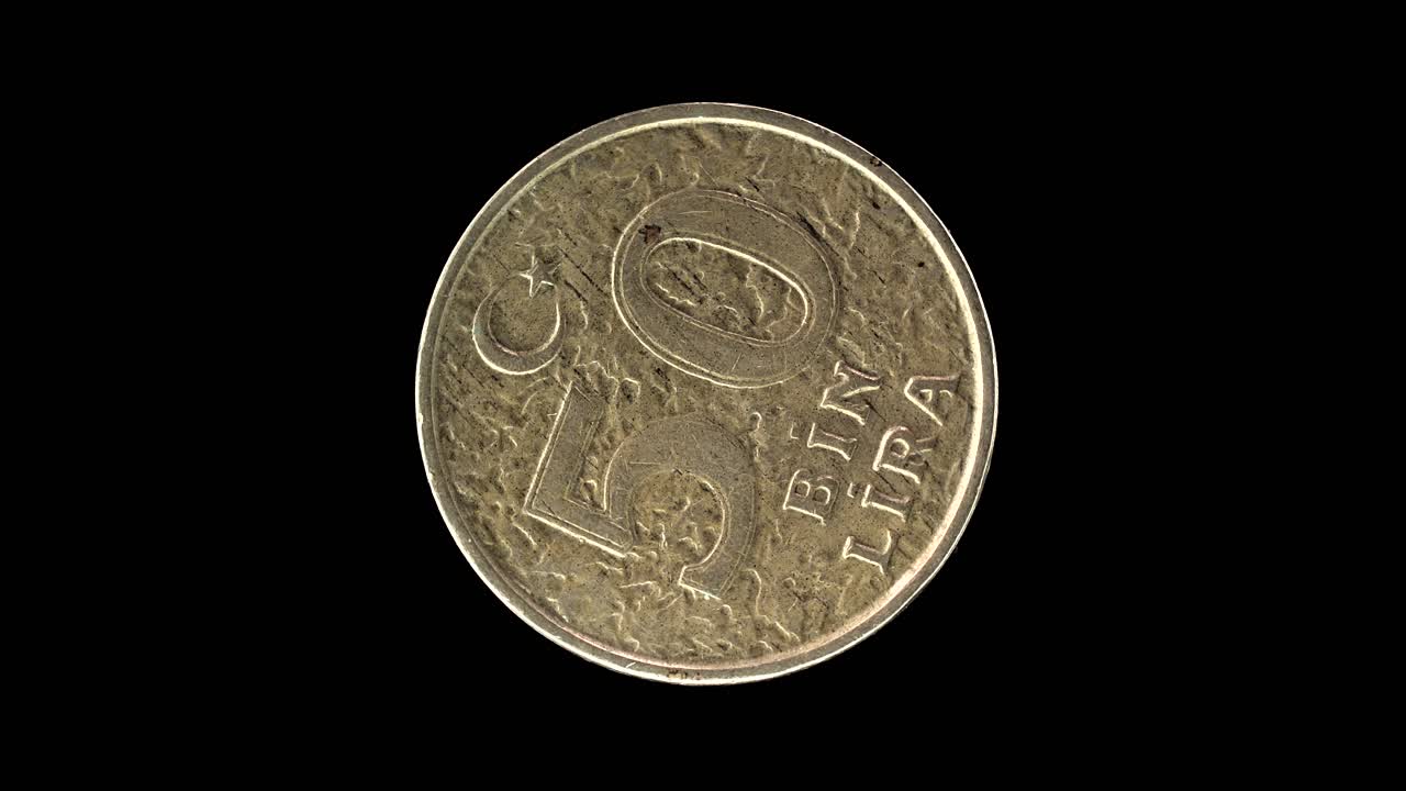 Turkey 1998 50 000 lira coin reverse with crescent star and value rotating on black background