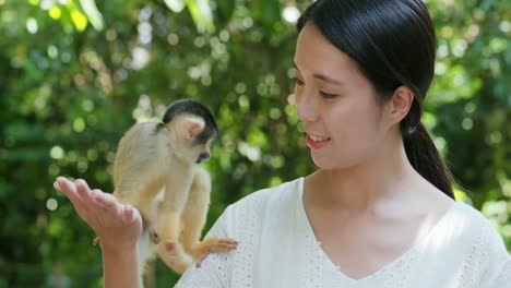 woman and squirrel monkey