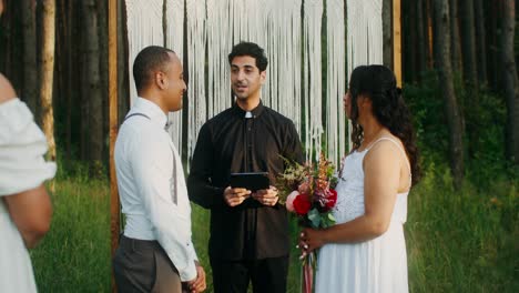 outdoor wedding ceremony in a forest