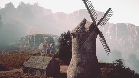 misty mountain windmill and cottage