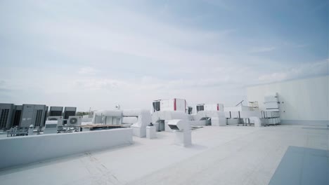 the air conditioning and ventilation system of a large industrial facility is located on the roof. it includes an air conditioner, smoke exhaust, and ventilation.