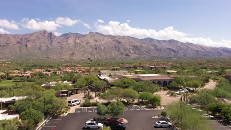 visitor parking lot at a luxury tucson arizona resort and spa, drone rise